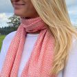 Coral scarf in diamond pattern